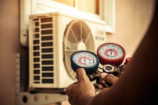 Professional Heat Pump Repair technician working in Manassas, VA